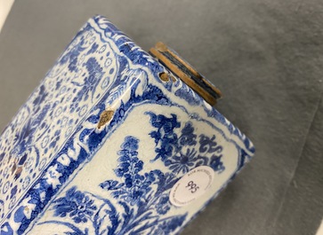 A rectangular Dutch Delft blue and white tea caddy with floral design, late 17th C.